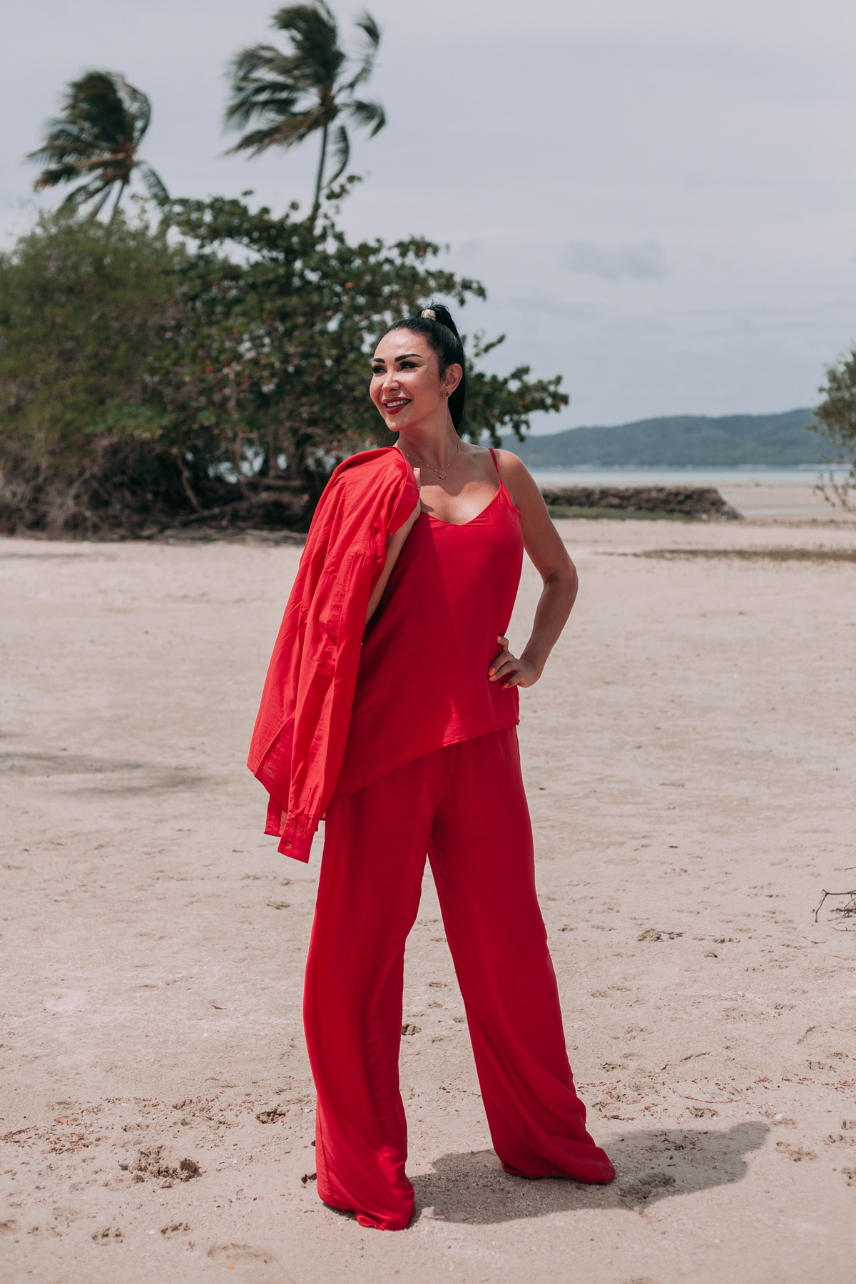 Carmine three-piece red silk-blend resort set with relaxed shirt, top and wide-leg trousers
