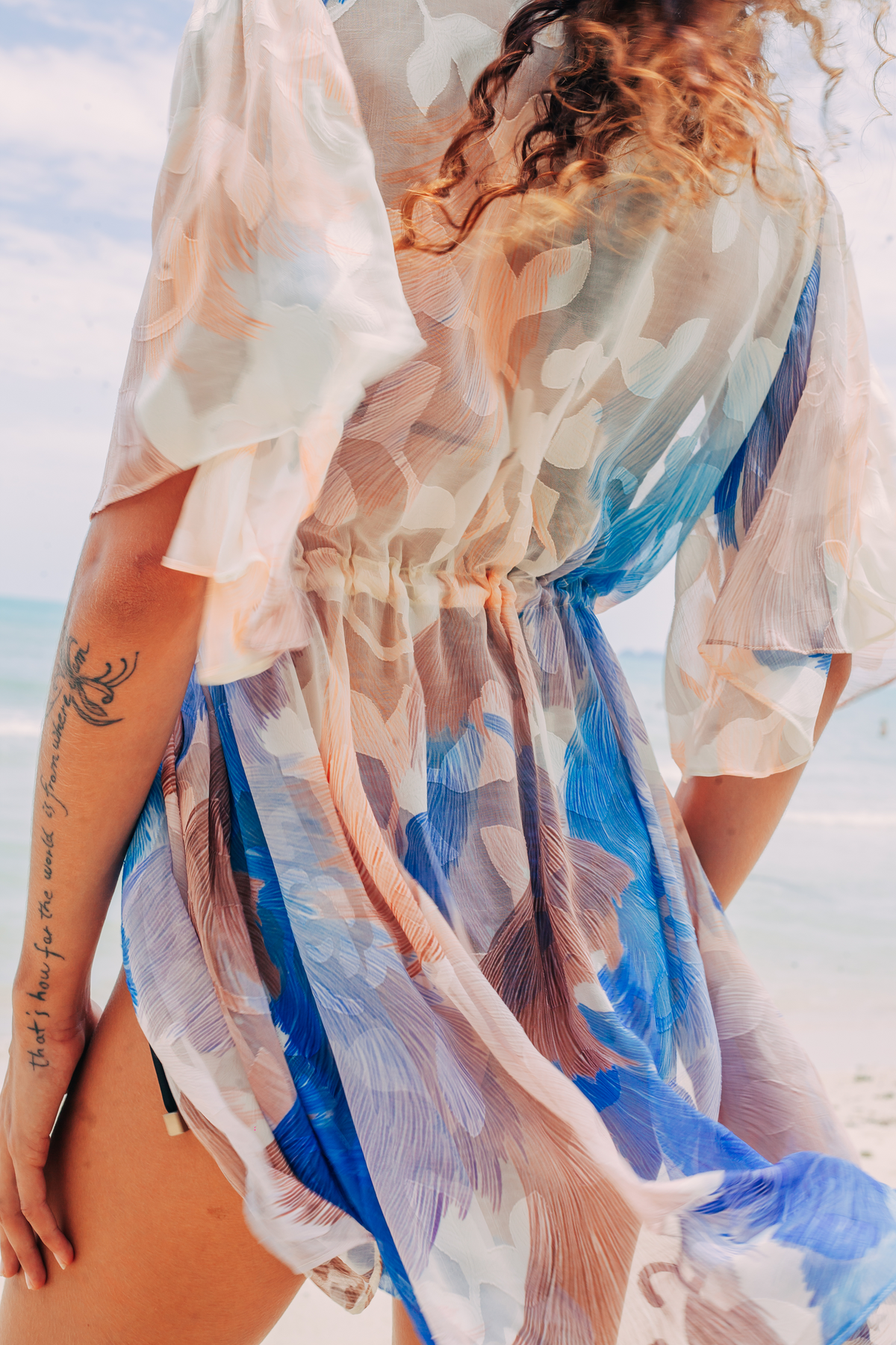 Back detail of Aveline Mini Tunic showing sheer fabric and drawstring waist