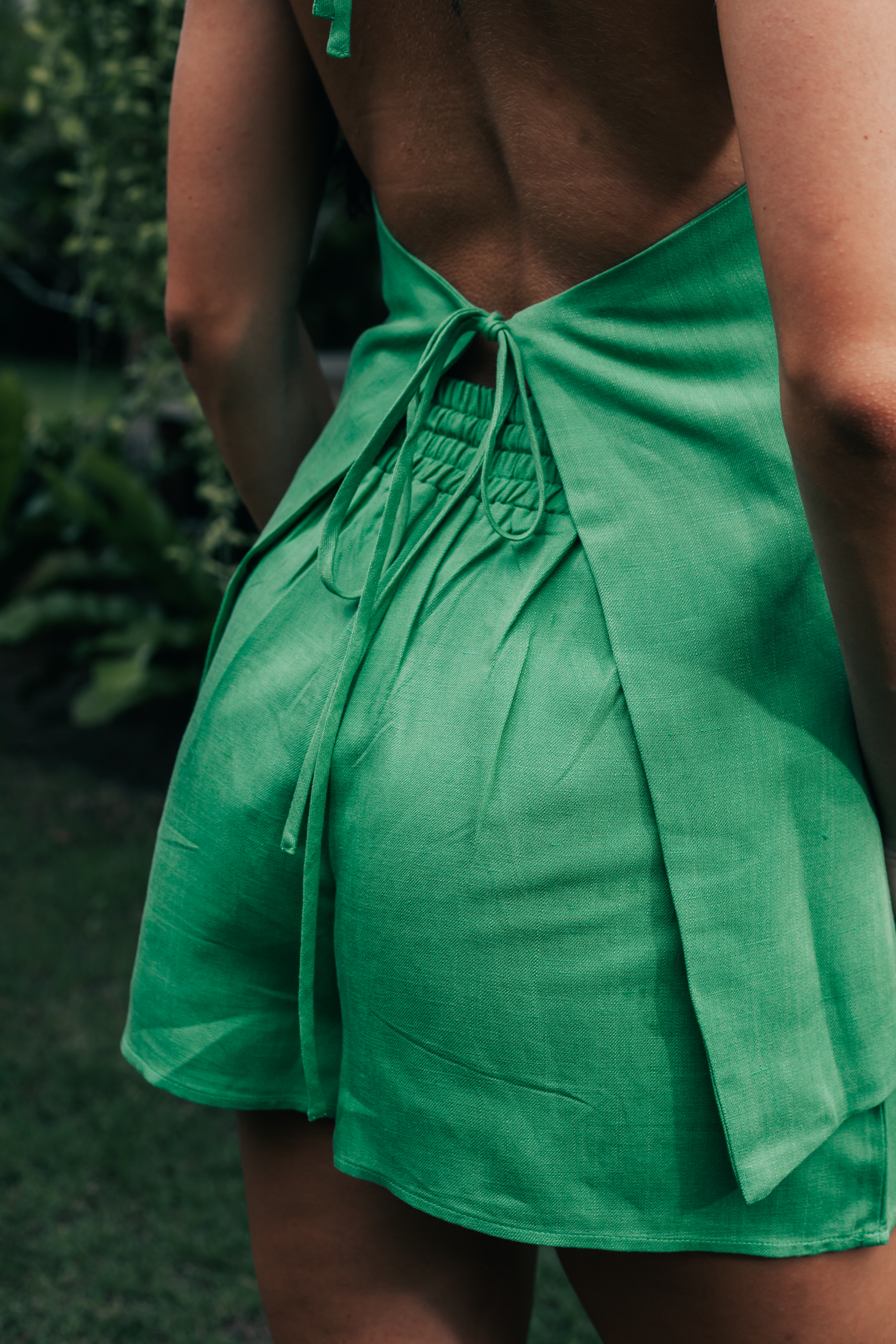 Close-up detail of Aris A-Line Shorts highlighting the fluid drape and movement.