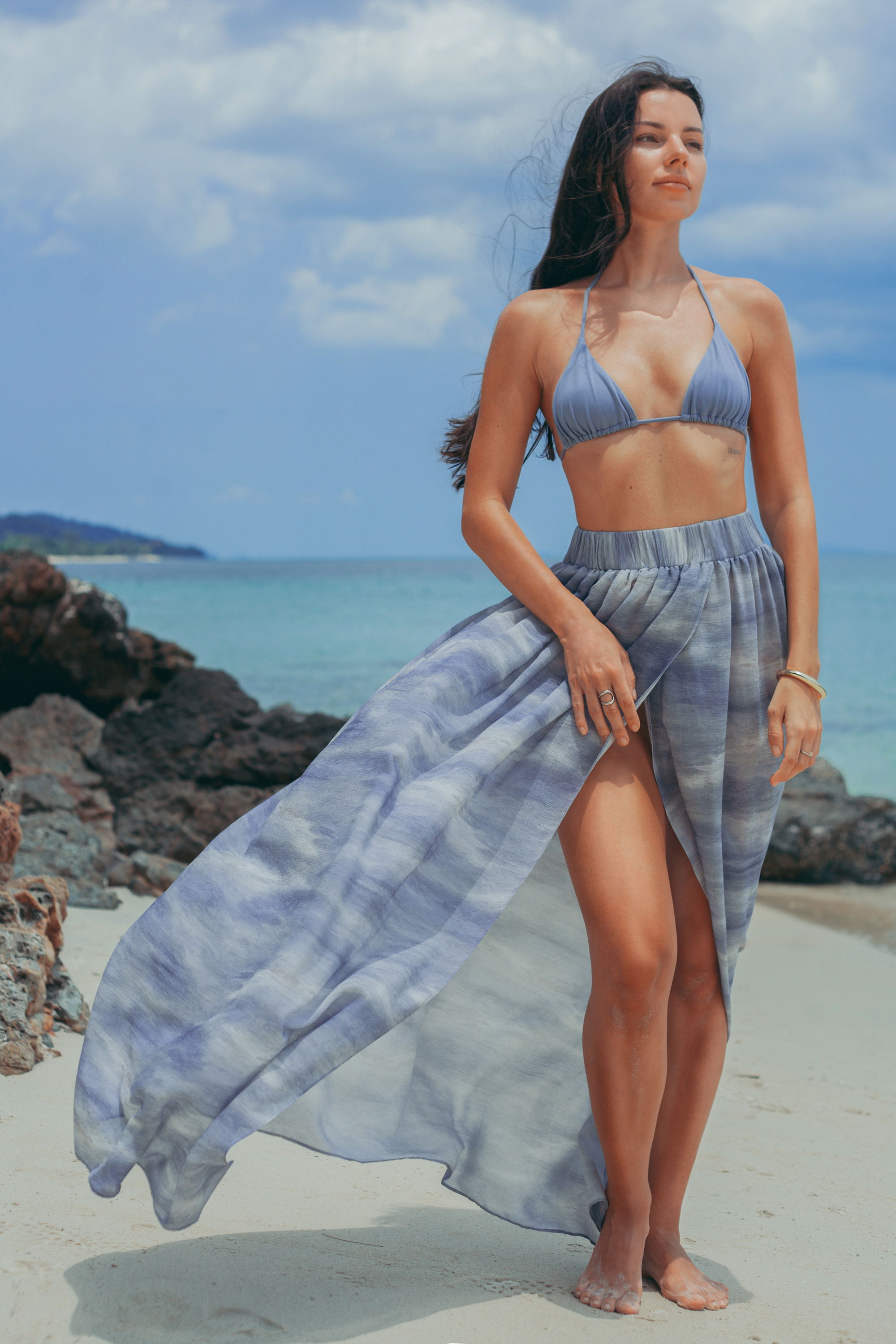 Elara Wrap Maxi Skirt in soft blue viscose blend with flowing silhouette, luxury resort wear for beach vacations