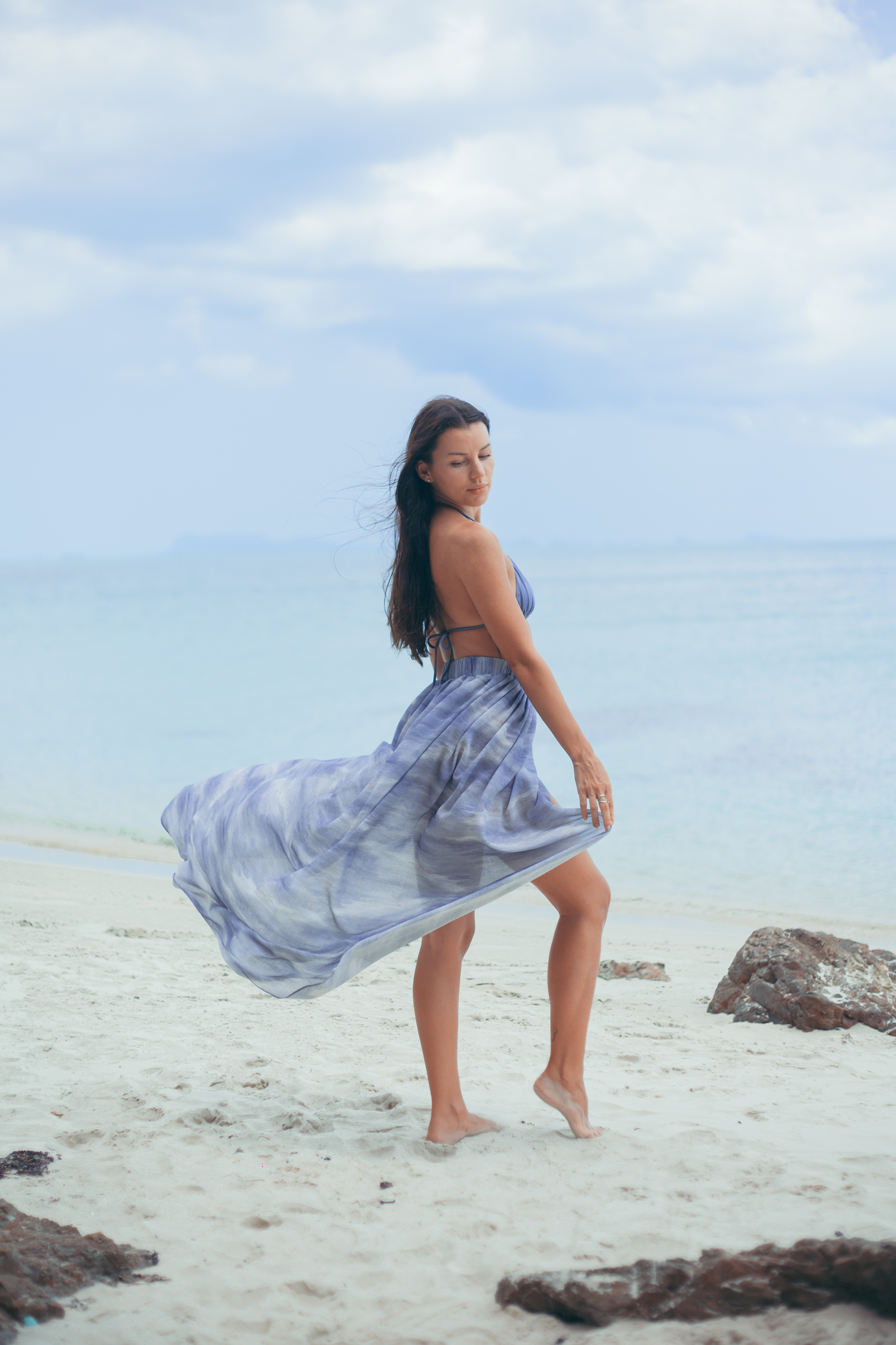 Full-length Elara Wrap Maxi Skirt in soft blue tones, elegant beach and resort maxi skirt